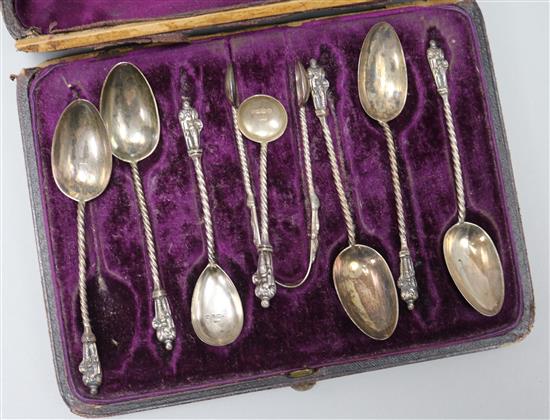 Seven assorted Victorian silver spoons and a pair of tongs, in case.